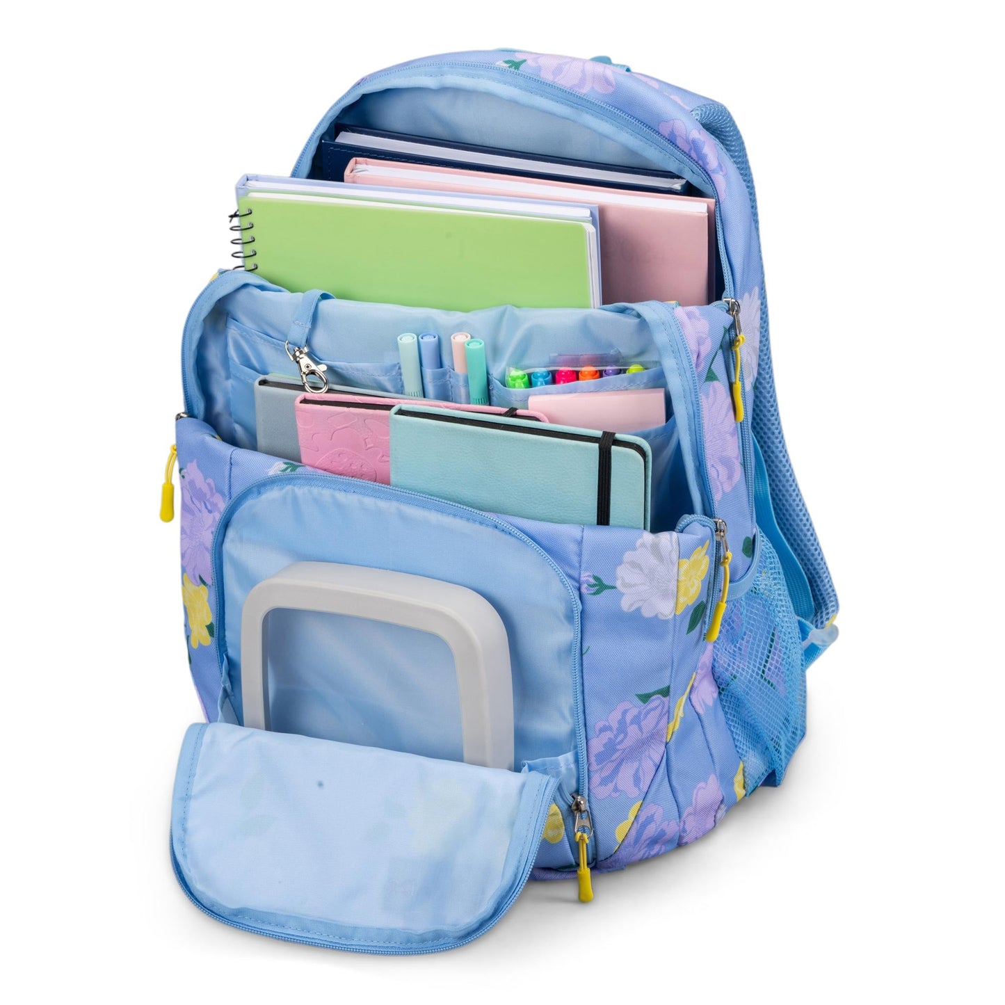 Blue floral print kids backpack open showing multiple compartments filled with notebooks, markers, and a lunch box