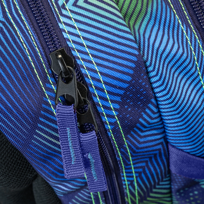 Backpack close-up showing dual black zipper pulls on blue green geometric stripe patterned fabric with neon yellow stitching